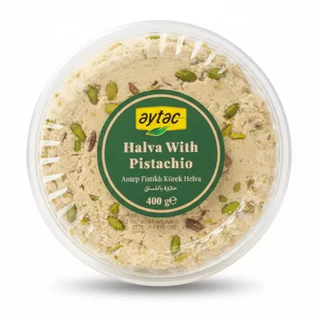 Top view of Aytac Pistachio Halva in clear resealable container showing pistachio pieces