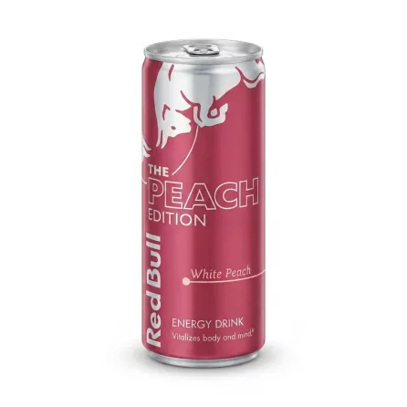 A 250ml can of Red Bull The Peach Edition White Peach energy drink, featuring its distinctive pink and silver design, is centered against a clean white background with a soft, even shadow.