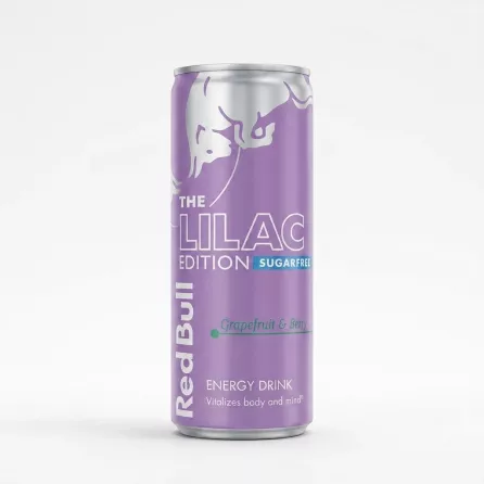 A 250ml can of Red Bull The Lilac Edition Sugarfree, a grapefruit and berry flavored energy drink. The can has a light purple matte finish with silver lettering and a prominent Red Bull logo at the top.