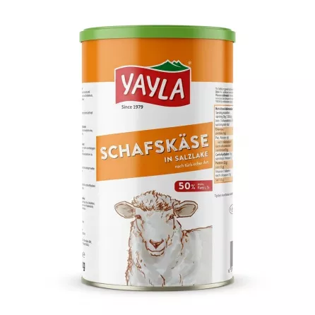 A front-facing studio shot of a 1.5kg Yayla Sheep's Cheese in Brine tin, featuring the Yayla brand logo, the text 'SCHAFSKÄSE IN SALZLAKE', a 50% fat content badge, and an illustration of a sheep. The tin has a white and orange body with a green lid, presented on a pure white background with a soft, even shadow.