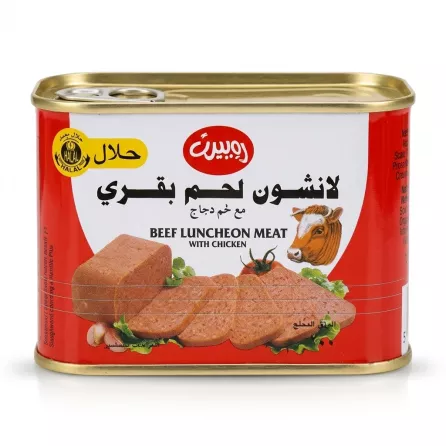 A 1:1 e-commerce photo of a Robert Halal Beef Luncheon Meat can against a clean white background. The front of the red and white can features a cow illustration, slices of the product, and text in both English and Arabic.