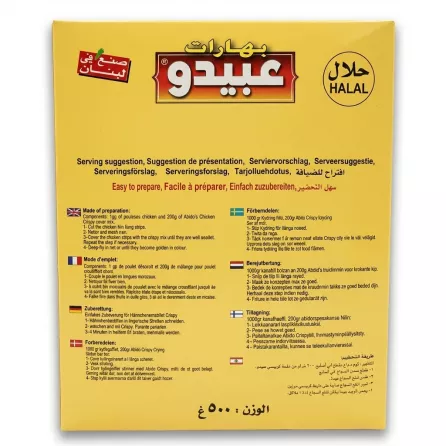 A high-resolution, professional e-commerce photograph of the back of the Abido Hot 'n Spicy Crispy Chicken Mix 500g box. The image shows detailed preparation instructions in multiple languages, the Halal logo, and the brand's 'made in Lebanon' stamp against a clean, neutral background with a soft, symmetrical shadow.