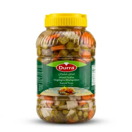 A 3750g large glass jar of Durra Mixed Pickles, featuring various vegetables like carrots and cucumbers, is presented in a clean, professional studio shot against a white background with a soft, even shadow.