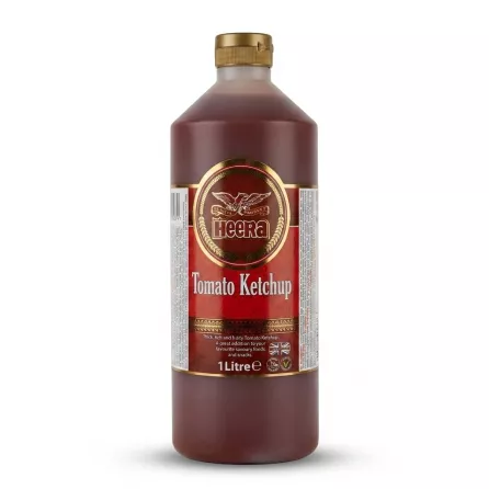 A 1:1 professional e-commerce product photograph of a 1 Litre bottle of Heera Tomato Ketchup, isolated on a clean white background. The bottle is centered, features its rich red sauce and distinct gold cap, with the front label text, including the Heera logo and size information, perfectly clean and in sharp focus. PRODUCT TITLE: Heera Tomato Ketchup 1L [Detailed Image of Heera Tomato Ketchup 1L bottle on a clean white background]