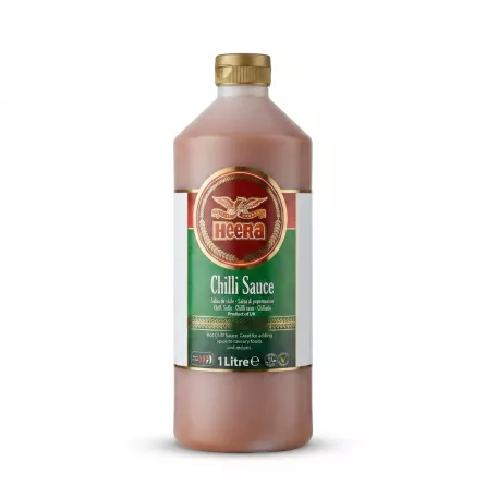 Enhanced Heera Chilli Sauce 1 litre bottle held in grocery aisle