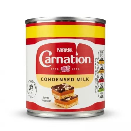 Enhanced Front view of Nestlé Carnation Condensed Milk 397g tin