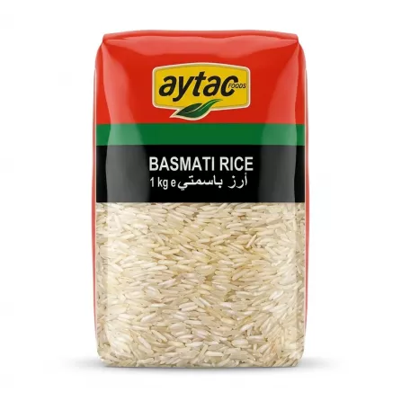 A professional product photo of a 1kg bag of Aytac Basmati Rice, featuring its red, green, and clear packaging with long-grain rice visible, set against a clean white background.