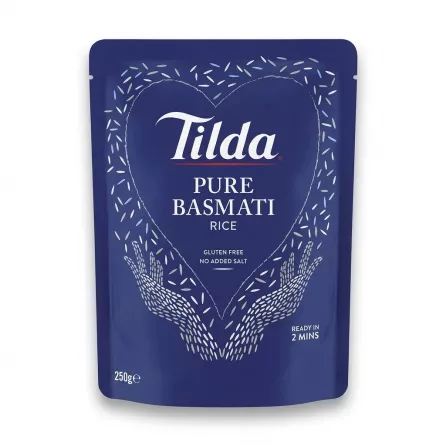 A 250g blue stand-up pouch of Tilda Pure Basmati Rice Classics is centered against a clean white background. The pouch shows product details and branding, and has soft, symmetrical shadows on both sides.
