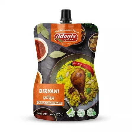 A 6 oz pouch of Adonis Spices Quick Biryani Marinade, featuring a visual of yellow rice, roasted chicken, and spices, with text in both English and Arabic. The packaging highlights "Mediterranean Flavor" and includes certifications for "Quality" and "GMO free," with a "Mild" spice level indicator.