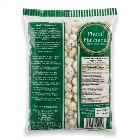 A 1:1 professional studio photo of the back of the Heera Phool Makhana Popped Lotus Seeds package, centered against a seamless white background. The clean, 100g clear plastic bag details the nutrition facts, product guarantee, 'Specially Packed For P&B (Foods) Ltd' in West Yorkshire, and allergens list (soya, barley, gluten, mustard, celery). The best before date 'Nov. 2027' and batch number are clearly visible on the lower right label.