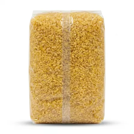 A clear back view of a 1:1 aspect ratio square packet of Safa Borgol Coarse White Bulgur wheat, standing upright on a seamless white surface with soft, even studio lighting and light, symmetrical shadows. The packaging is clear, showing the full, dense texture of the golden bulgur grains, with all external tags, labels, and the hand holding it completely removed, creating a clean, professional e-commerce product image.
