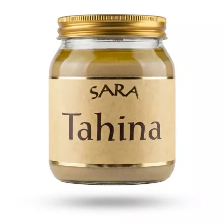 A 340g glass jar of SARA Tahina sesame paste with a golden lid and parchment label, presented in a centered e-commerce shot with a soft shadow.
