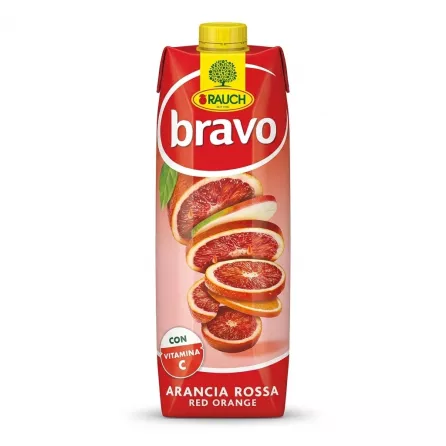 Enhanced Front view of Rauch Bravo Red Orange Juice carton held in hand, with vibrant red and sliced blood oranges on the packaging.