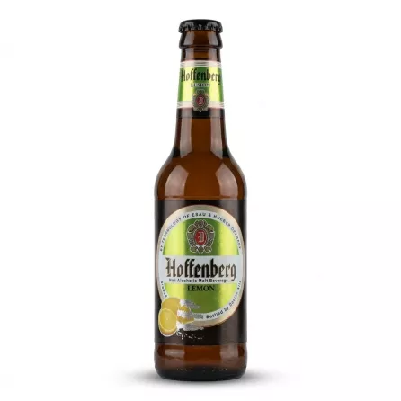 Enhanced Front view of Hoffenberg Lemon Non Alcoholic Malt Beverage 330ml bottle held in a shop aisle