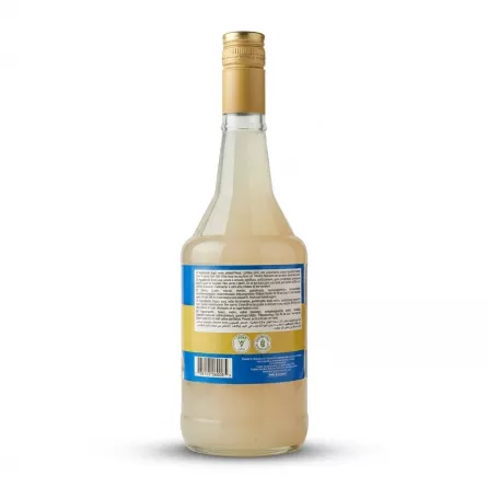 A 1:1 professional e-commerce product photograph of the back of a Cortas Almond Syrup 600ml bottle, showing its clear syrup, gold cap, and detailed back label. The label clearly lists ingredients in multiple languages, including English and Arabic, and features the specific "Vegan" and "Gluten Free" certification logos and other factory details seen in the original image. The bottle is perfectly centered against a pure white background with professional studio lighting.