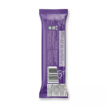 A professional back view e-commerce photo of a Mr. Bite Strike Hazelnut Bar in its purple wrapper, featuring detailed nutritional information, ingredients, and a clear barcode.