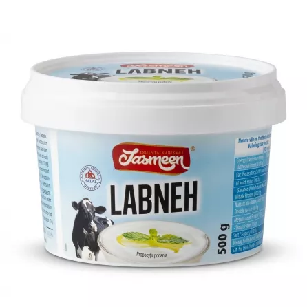 Enhanced Tasmeen Labneh 500g tub held in hand in front of supermarket dairy shelf
