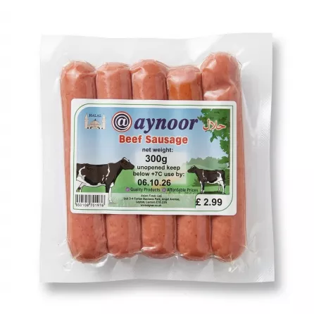 Enhanced Front of Aynoor Halal Beef Sausage 300g vacuum-sealed pack held in hand in a grocery store