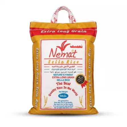 A 5kg bag of Nemat Sella Extra Long Grain Rice is centrally positioned on a clean white background. It features clear red and white branding with text in multiple languages and a 'Premium Quality' seal.