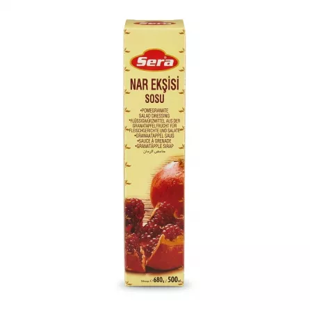 Front view of Sera Pomegranate Salad Dressing 680g box showing product name and pomegranate imagery