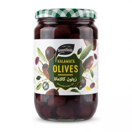 Front label of Greenfields Kalamata Olives 720g jar held in hand