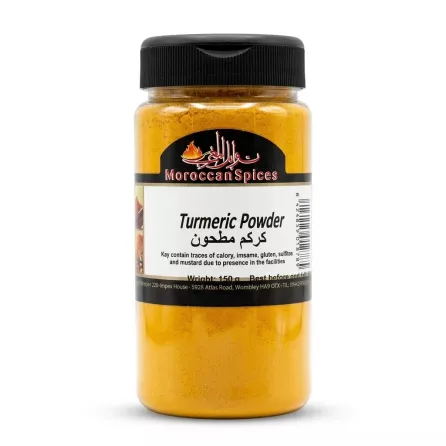 Front view of Moroccan Spices Turmeric Powder jar held in hand