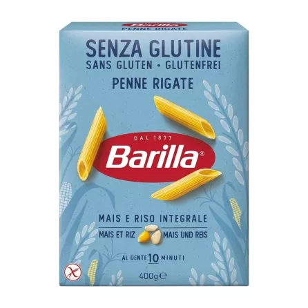 A 400g box of Barilla Gluten Free Penne Rigate pasta made with corn and brown rice, presented in a clean studio setting.