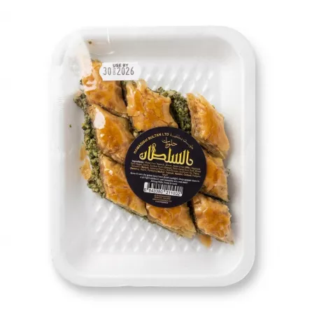 Packaged Hamadiah Sultan baklava selection with visible nuts and syrup, labelled with ingredients and price