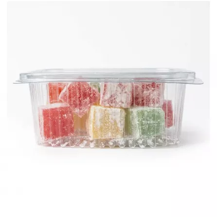 Side view of plastic container showing layers of multi-coloured Turkish Delight cubes