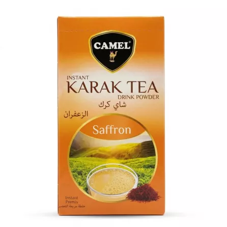 Front view of Camel Karak Tea Saffron drink powder packaging held in hand