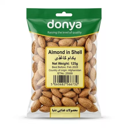 Front of Donya Almond in Shell 125g pack held in hand on store shelf