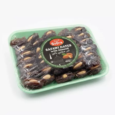 Angled view showing Sofra Safawi Dates with Almond 400g pack held in hand