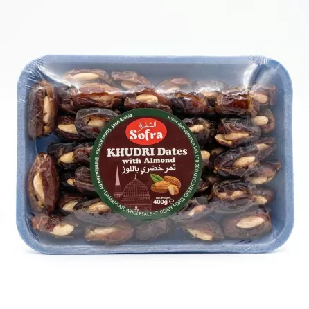Pack of Sofra Khudri Dates with Almond, 400g, held in a shop aisle