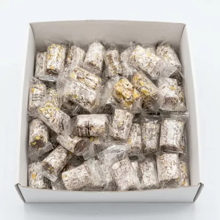 Individually wrapped Liban Vert Malban Araysseh Coated Extra pistachio sweets in a display box