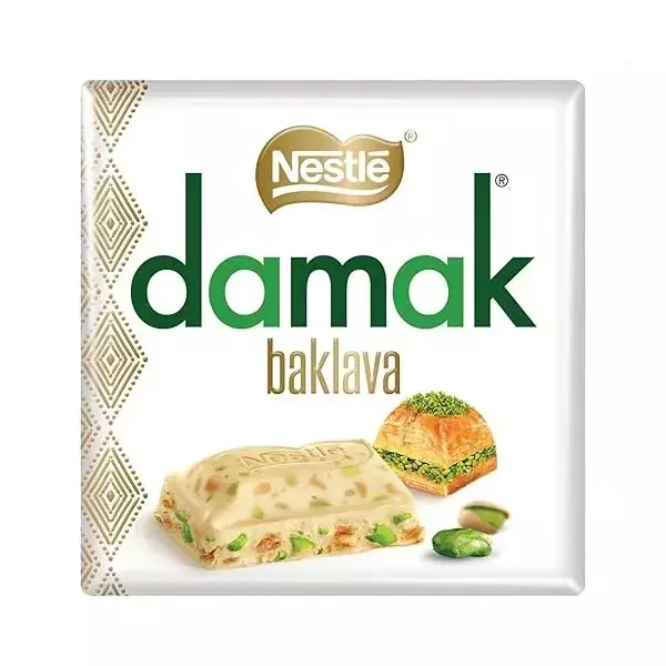 Nestle Damak White Chocolate with Pistachios and Baklava 60g - a luxurious blend of white chocolate, pistachios & baklava. Available at halalo.co.uk and Halalo.