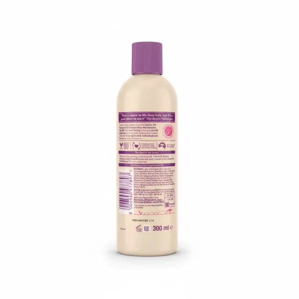 Back view of Aussie Bouncy Curls Shampoo bottle showing ingredients and usage