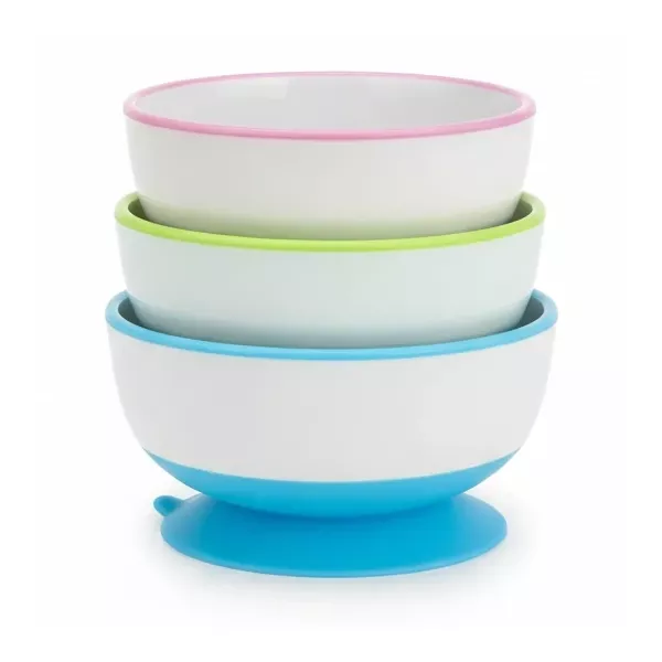 Three stacked Munchkin Stay Put suction bowls with pink, green, and blue rims