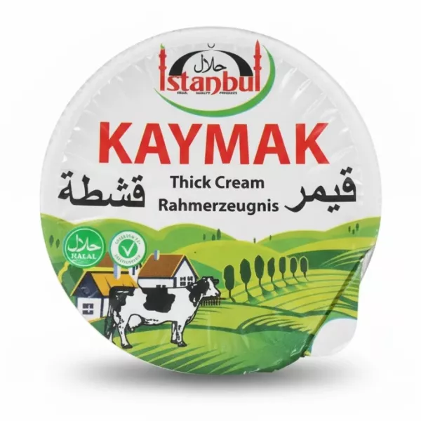 Istanbul Kaymak thick cream container top label with cow and green field illustration