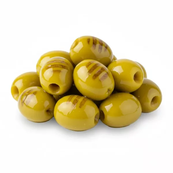 Close-up of shiny grilled green olives in brine lose without without plate on a white back ground