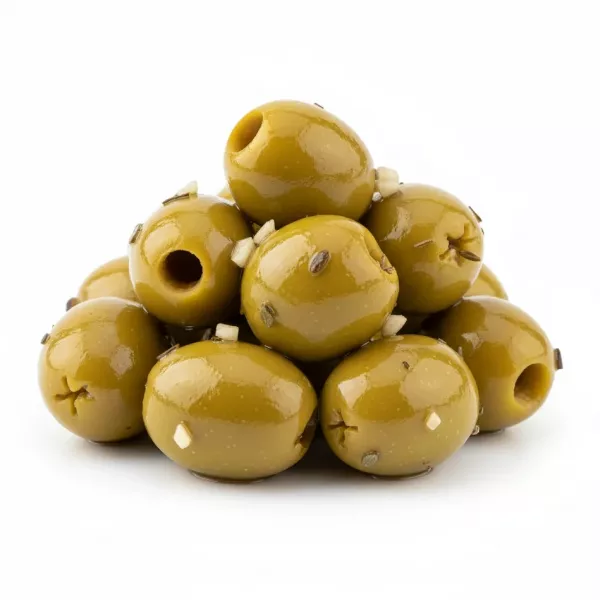 Close-up of plump green olives marinated with herbs and garlic in oil lose outside container without plate