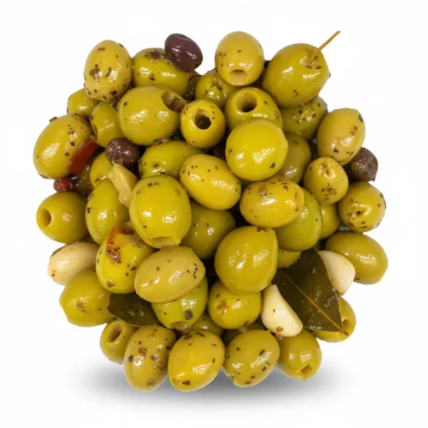 Close-up of pitted green olives marinated with herbs