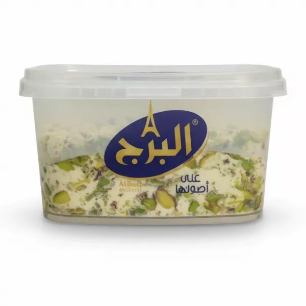 Side view of Alburj Pistachio Halva tub highlighting packaging design and pistachio pieces