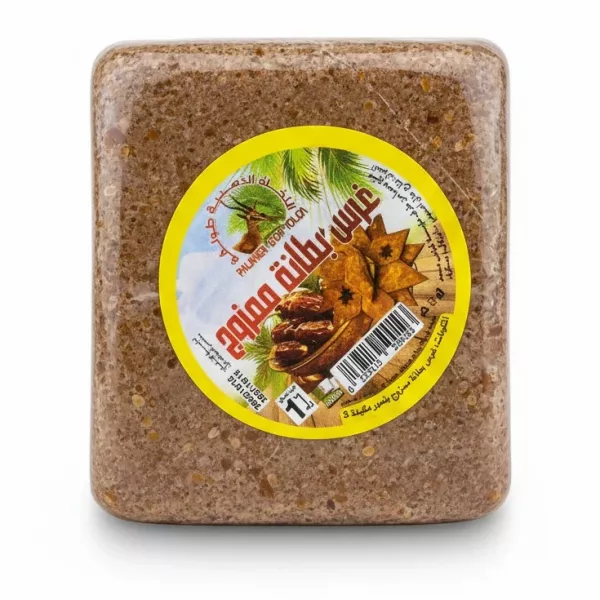 Block of Algerian date paste wrapped in clear plastic with label