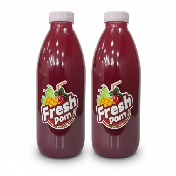 Twin Bottles of Fresh Pom natural pomegranate juice with colourful label