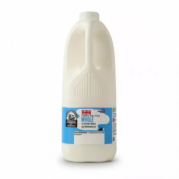 Sainsbury's fresh British whole milk bottle with fat percentage and UK flag on label