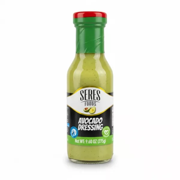 Bottle of Seres Foods avocado dressing with green and red cap enlarged image on a white background