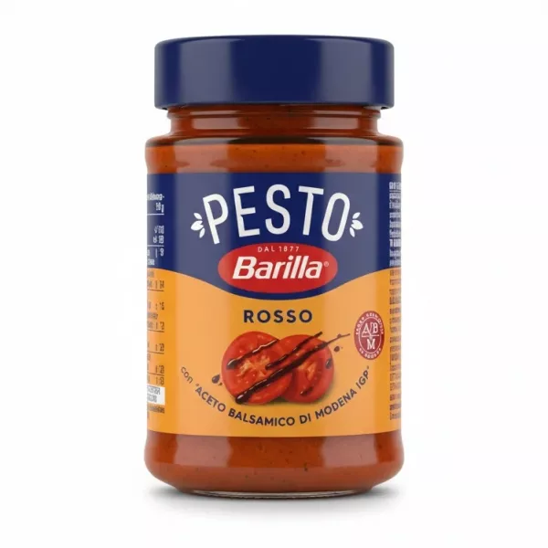 Jar of Barilla Pesto Rosso sauce with blue lid and orange label