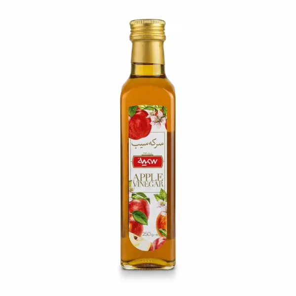 Glass bottle of Somayeh apple vinegar with apple and floral label design