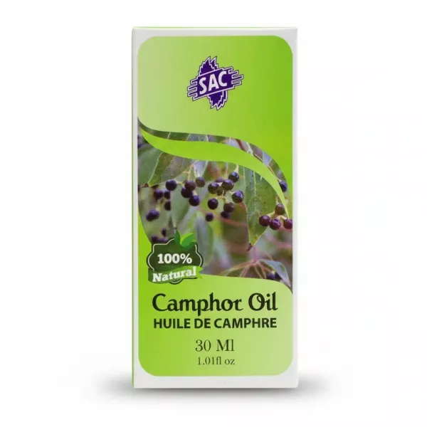 Hand holding SAC Camphor Oil 30ml packaging with 100% natural label and camphor plant illustration