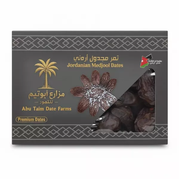 Box of Abu Taim Jordanian Medjool Dates with transparent window showing dates inside